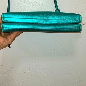 Unique Coach purse metallic sea green